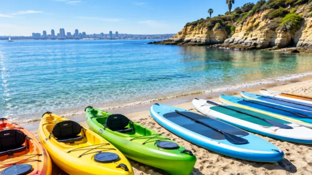 Kayaks and paddleboards on a San Diego beach
